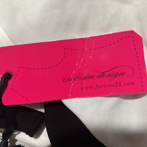 New with tag Black and white top | armless, Sleeveless| High low top | Work - Picture 2 of 2